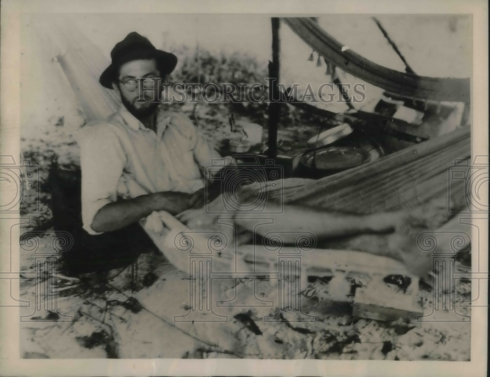 1939 Press Photo Dr. Zahl, tanned and bewhiskered reclines in a hammock in camp- Historic Images