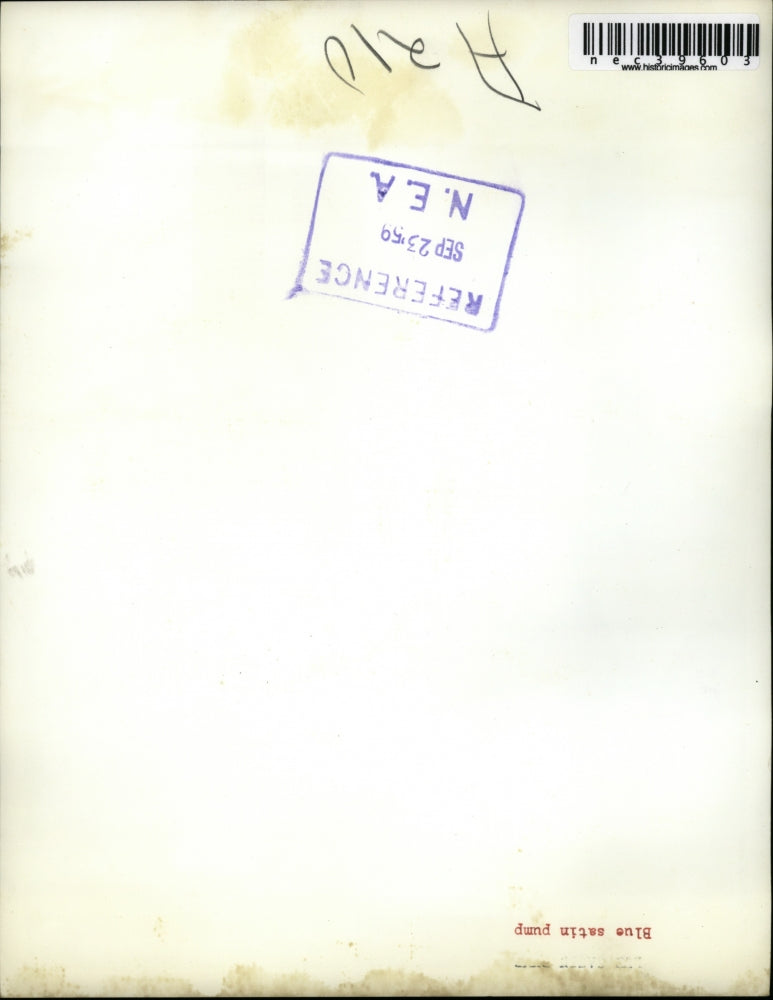 1959 Press Photo Woman Modeling Blue Satin Pumps