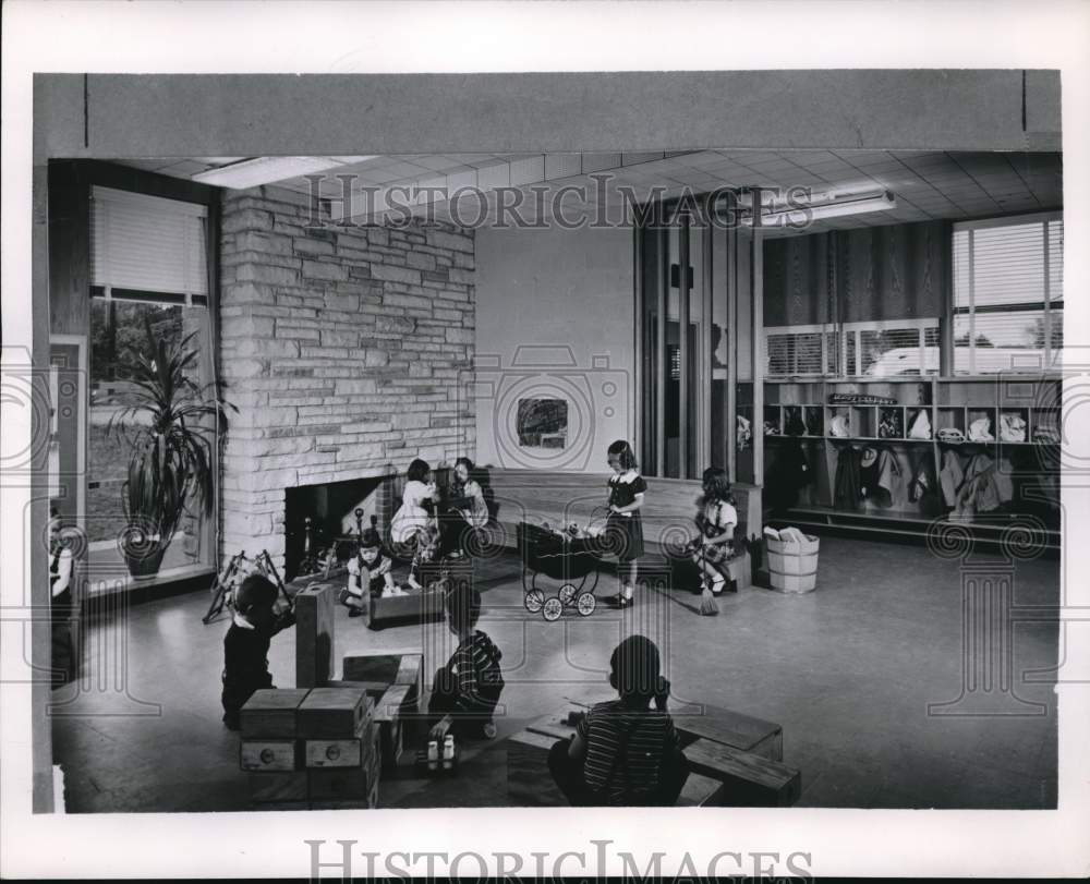 1954 Press Photo Children play happily in a classroom at a new school- Historic Images