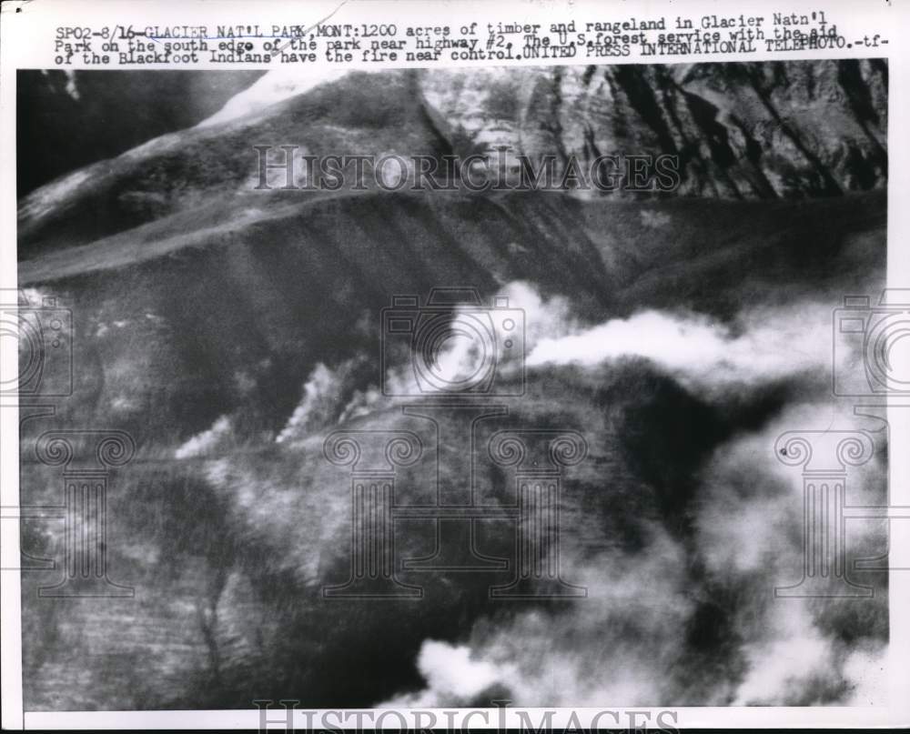 1958 Press Photo Aerial view of fire-ravaged Glacier National Park, Montana- Historic Images