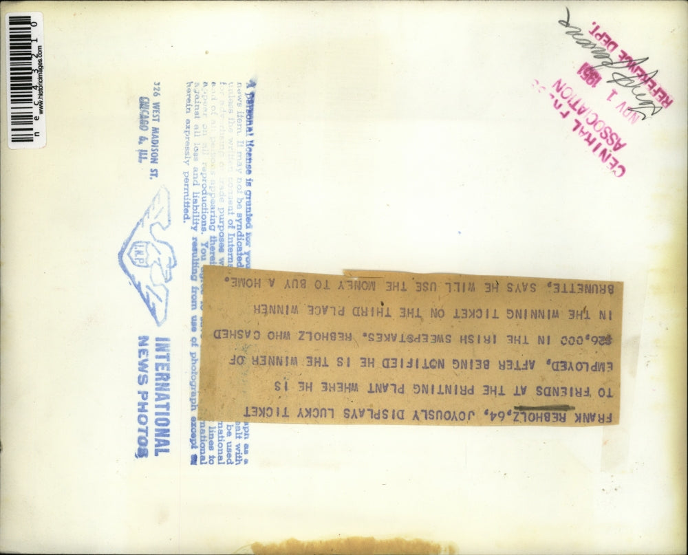 1951 Press Photo Frank Rebholz Displays Lucky Ticket in Irish Sweepstakes