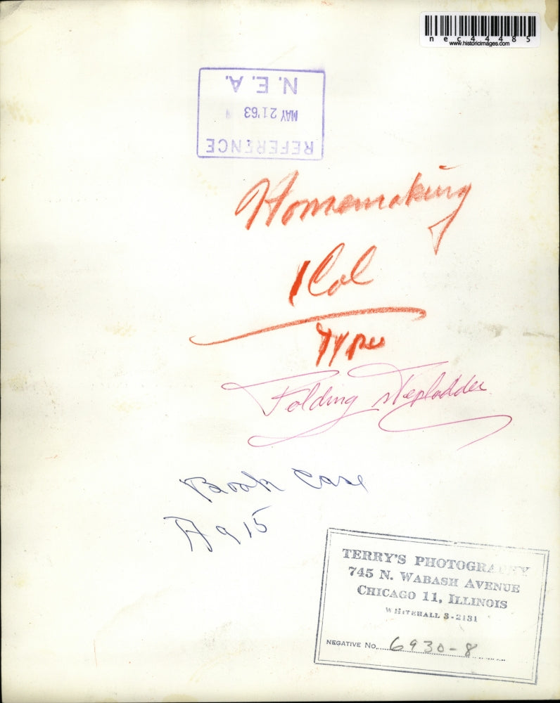 1963 Press Photo Woman on Folding Stepladder Dusting Bookcase