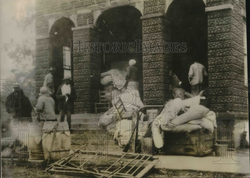 Load image into Gallery viewer, 1927 Press Photo Refugees moving to a temporary shelter prepared by Red Cross
