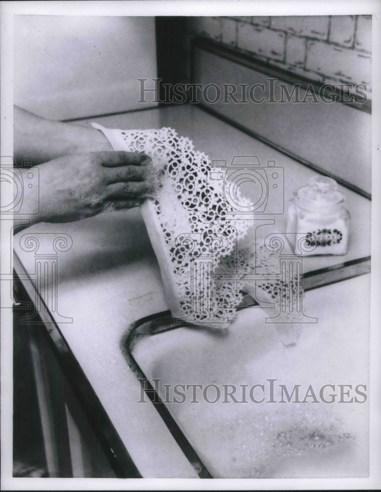 Load image into Gallery viewer, 1957 Press Photo Refurbishing lace.
