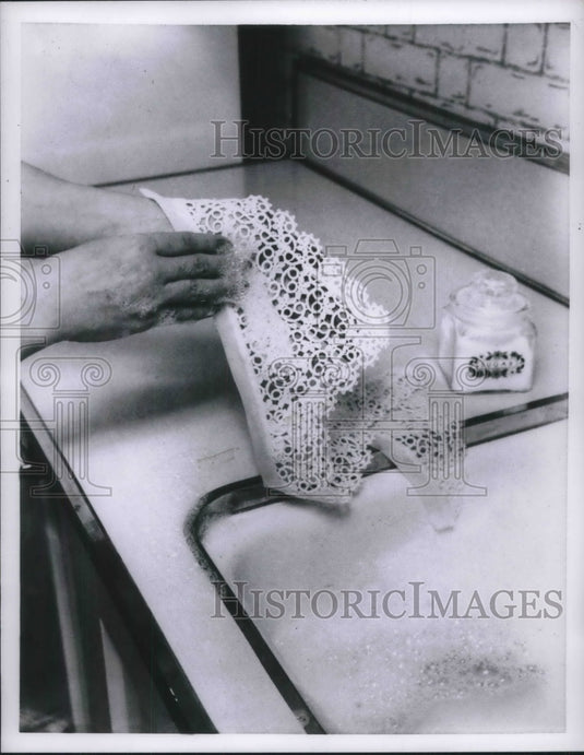 1957 Press Photo Refurbishing lace.