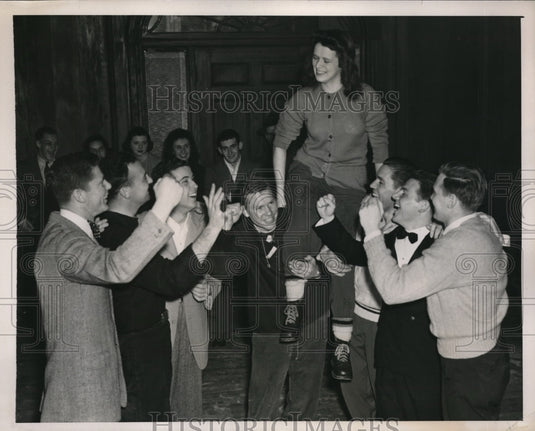 1941 Press Photo Joan Walters, Queen of Dartmouth Winter Carnival Raised High
