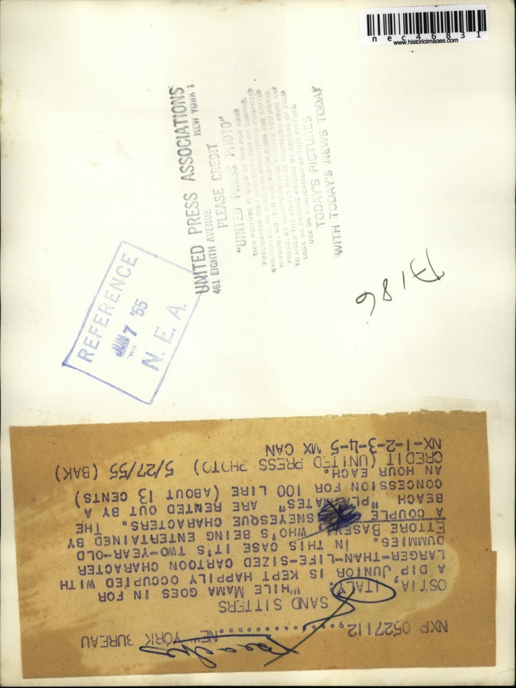 1955 Press Photo Italian Toddler Ettore Basevi On Beach With Cartoon Characters