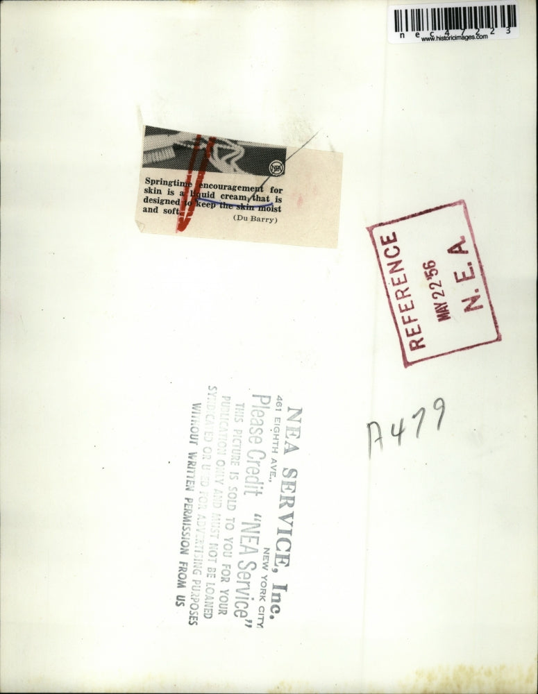 1956 Press Photo Model Shows Liquid Cream Makeup Application - nec47223