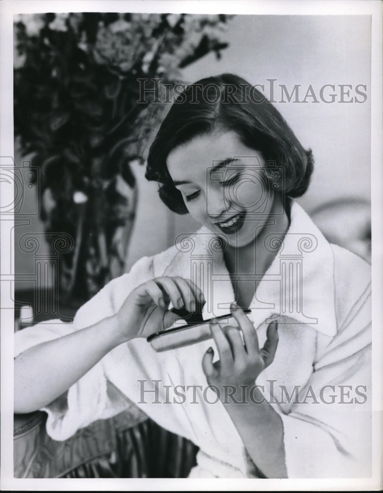 1950 Press Photo Nail care- Historic Images