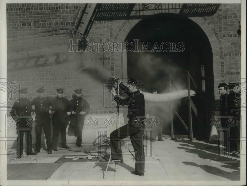1936 Press Photo Fireman Edward Lamb Invented Device to Minimize Smoke