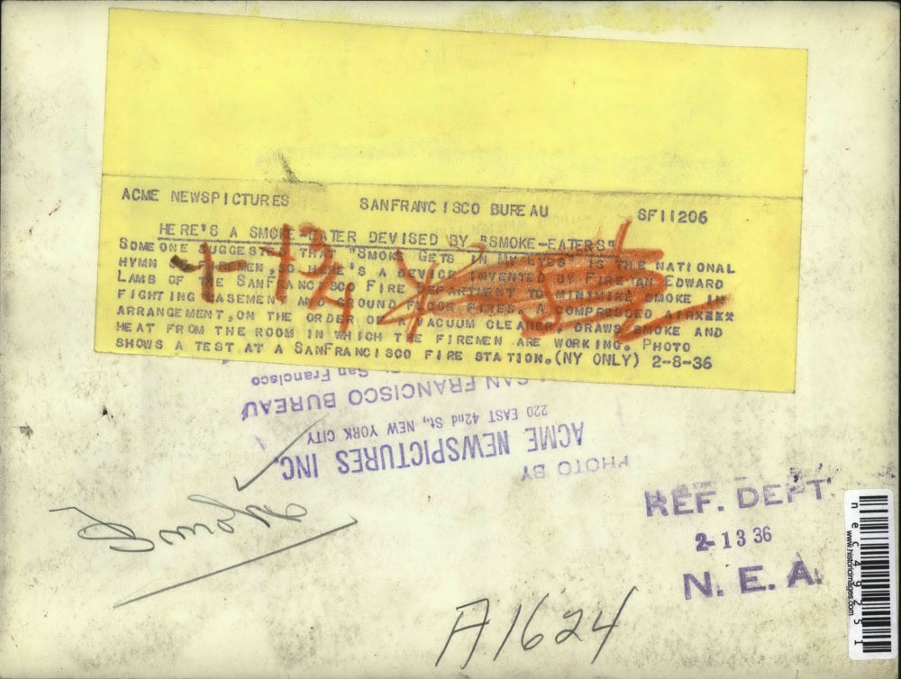 1936 Press Photo Fireman Edward Lamb Invented Device to Minimize Smoke