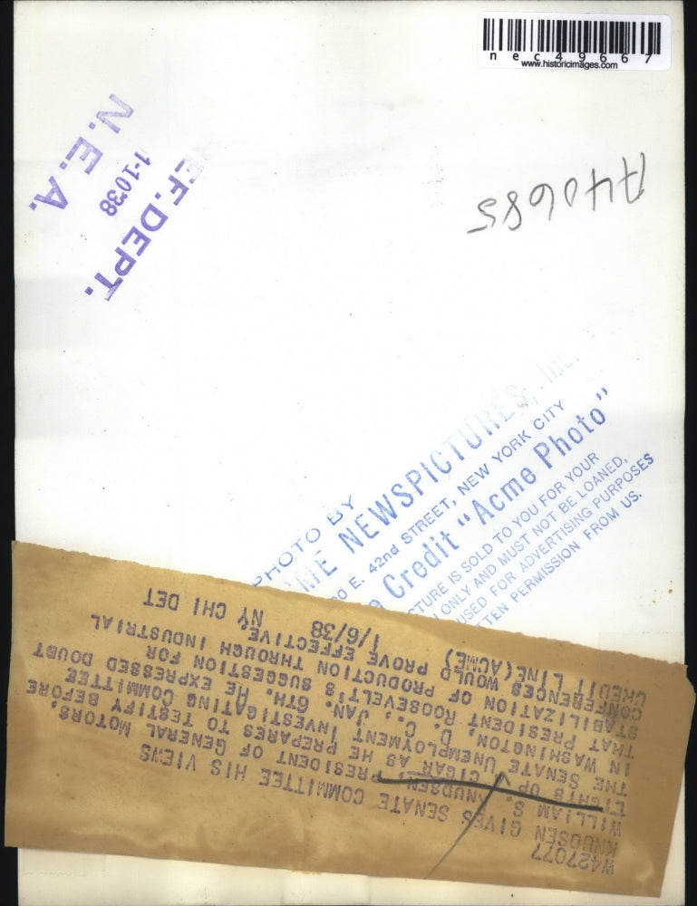 1938 Press Photo William Knudsen, Pres of General motors lights up cigarette