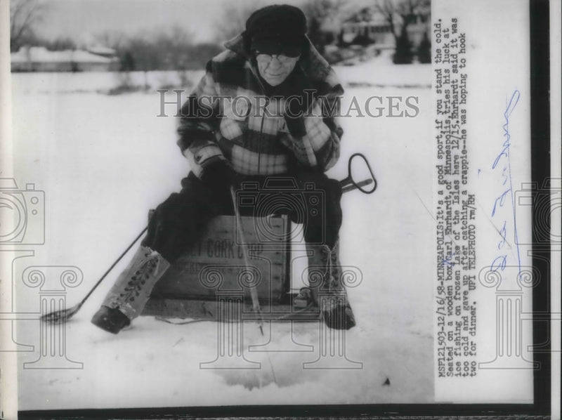 Load image into Gallery viewer, 1958 Press Photo Carl Ehrhardt, ice fishing at Lake of the Isles at Minneapolis
