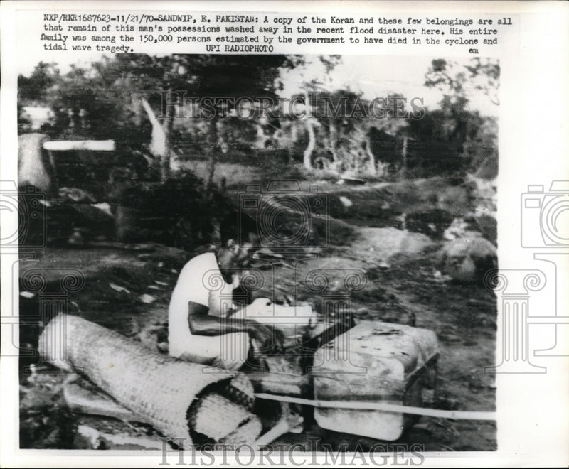Load image into Gallery viewer, 1970 Press A Copy of the Koran &amp; few belongings are all that's left after flood
