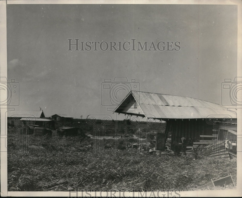 Load image into Gallery viewer, 1929 Press Photo Freak storm in Florida destroys building near Canal Point
