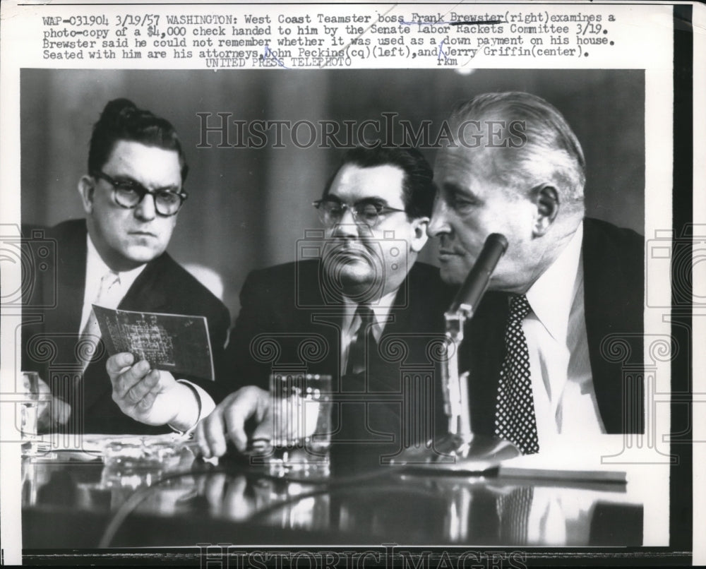 1957 Press Photo Teamster Boss Frank Brewster Hands Over Bribery Check To Senate