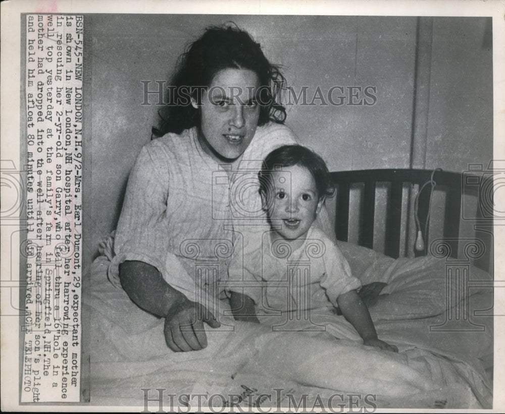 1949 Press Photo Mrs. Earl Dumont saves 2-year-old son Garry who fell in well