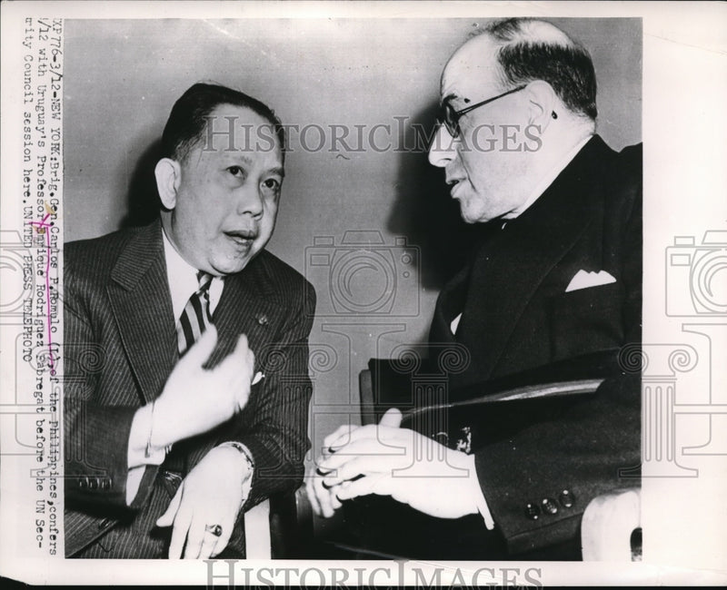 Load image into Gallery viewer, 1953 Press Photo Gen. Carlos P. Romulo with Enrique Rodriguez before a meeting.
