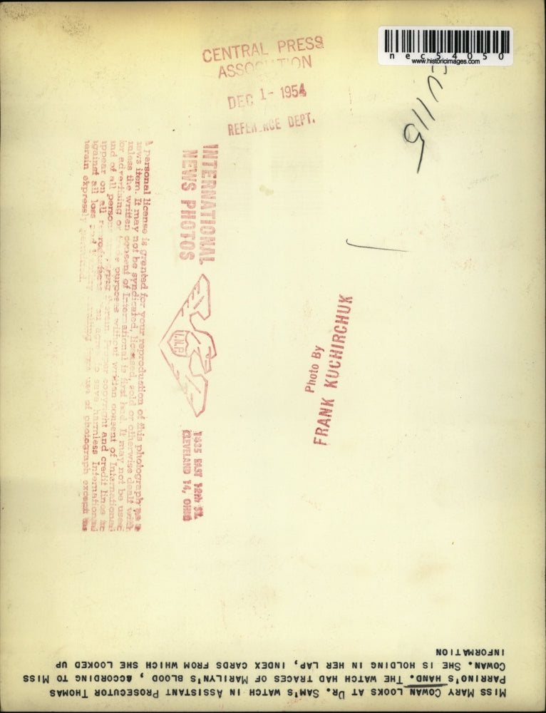 1954 Press Photo Miss Mary Cowan looks at watch in Thomas Parrino's hand.