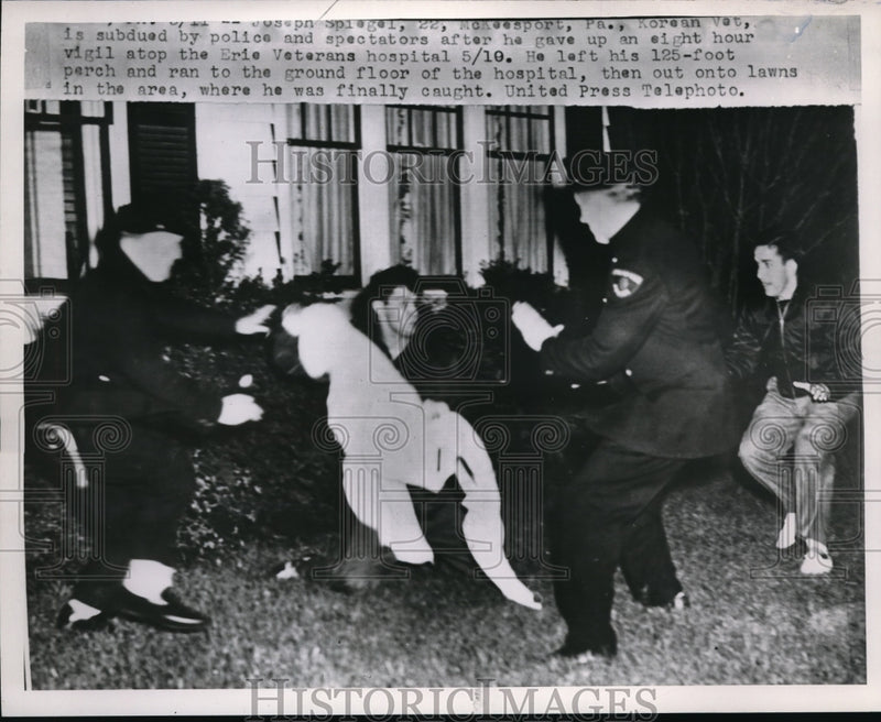 Load image into Gallery viewer, 1953 Press Photo Joseph Spiegel Subdued by police and spectators after vigil
