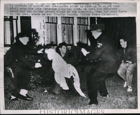 1953 Press Photo Joseph Spiegel Subdued by police and spectators after vigil
