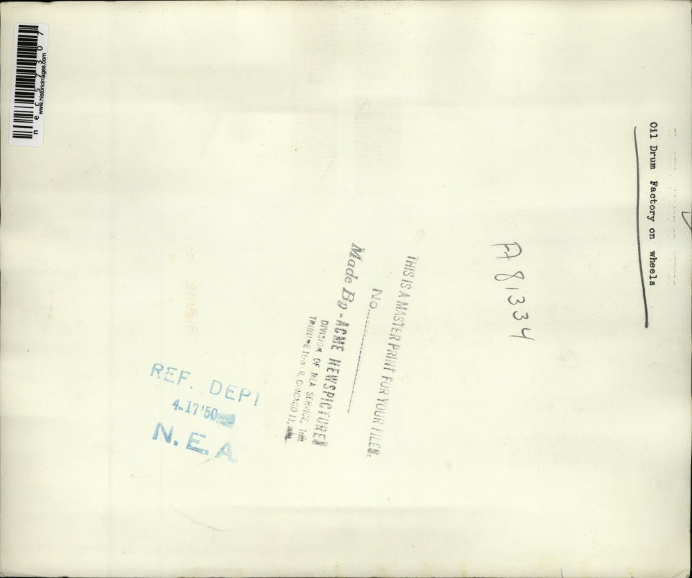 1950 Press Photo Cars Line Up For Oil Drum Factory On Wheels