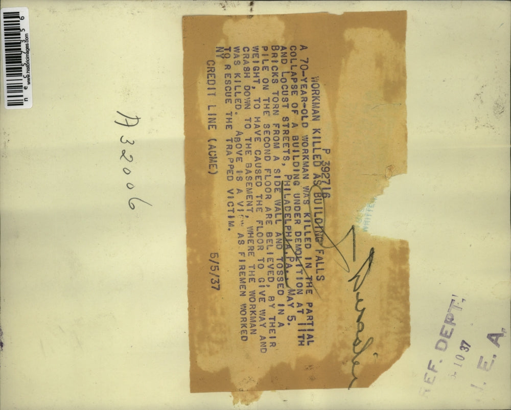 1937 Press Photo Workman killed as building falls at 11th & Locust St.,