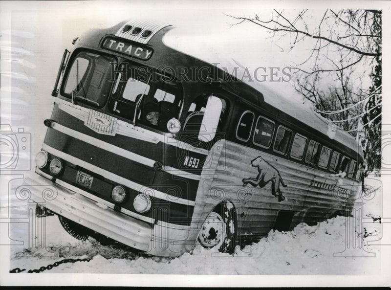 Load image into Gallery viewer, 1951 Press Photo New Ulm, Minn. bus skidded off road in snow storm
