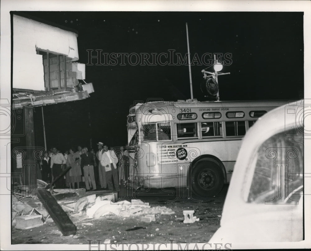 1951 Press Photo Passenger bus crashed into a gas station