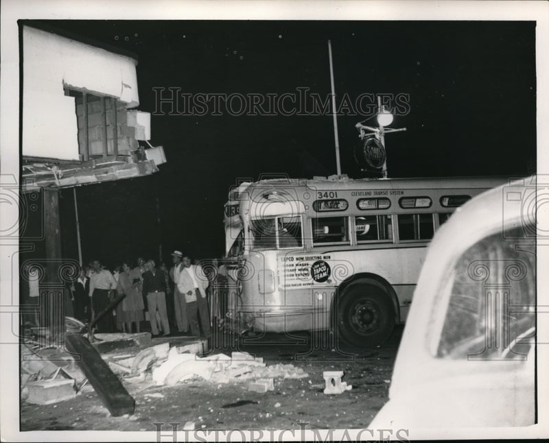 Load image into Gallery viewer, 1951 Press Photo Passenger bus crashed into a gas station
