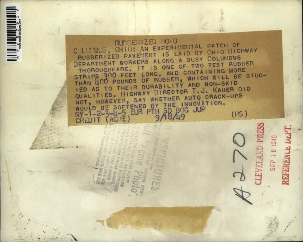 1949 Press Photo An experimental patch of rubberized pavement. - nec57912