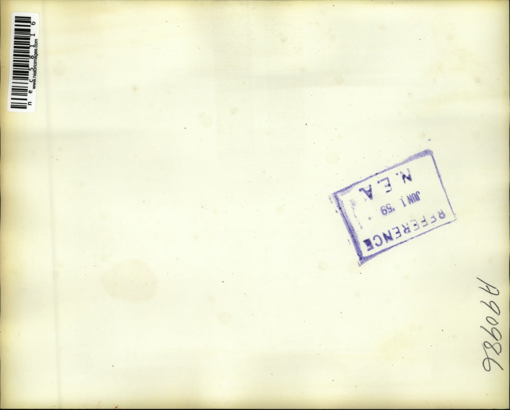 1959 Press Photo Peoria Illinois Cop Walt Johnson Looks At Car Stuck In Pothole