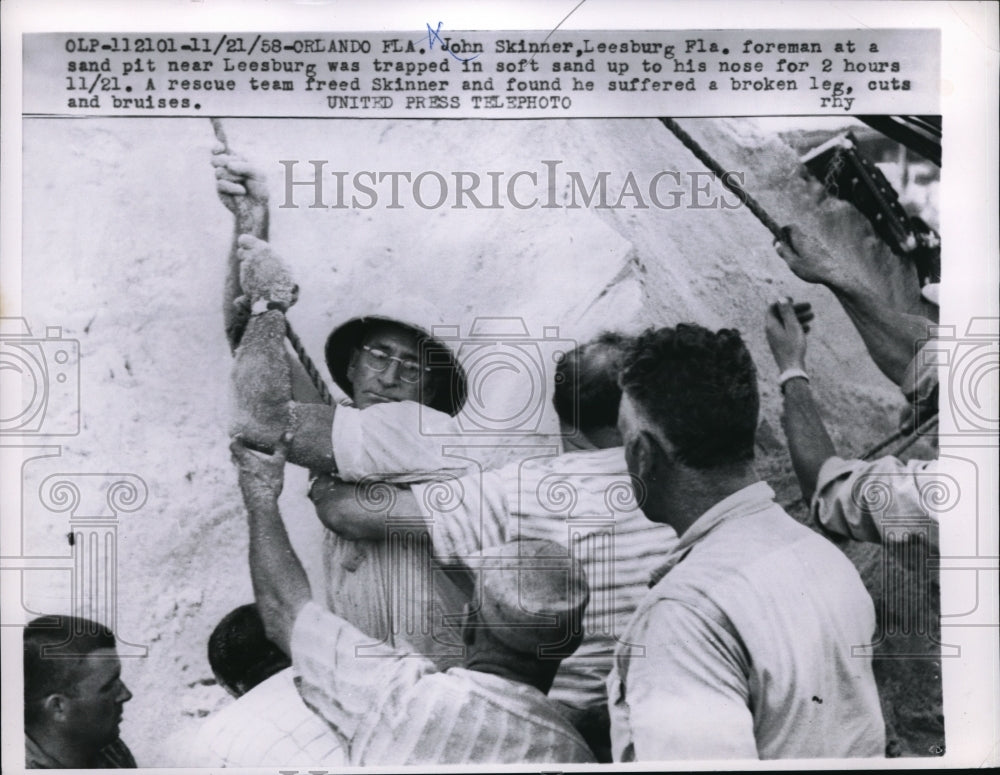 1958 Press Photo Orlando, Fla John Skinner rescued from cave in at sand pit