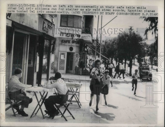 1948 Press Photo Citizens run for shelter as air raid siren sounds.
