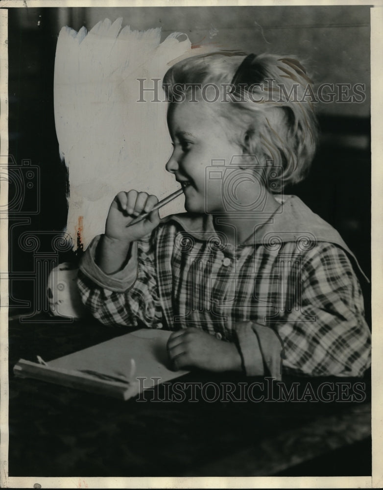 1929 Press Photo One of the orphaned children in foster homes getting lessons