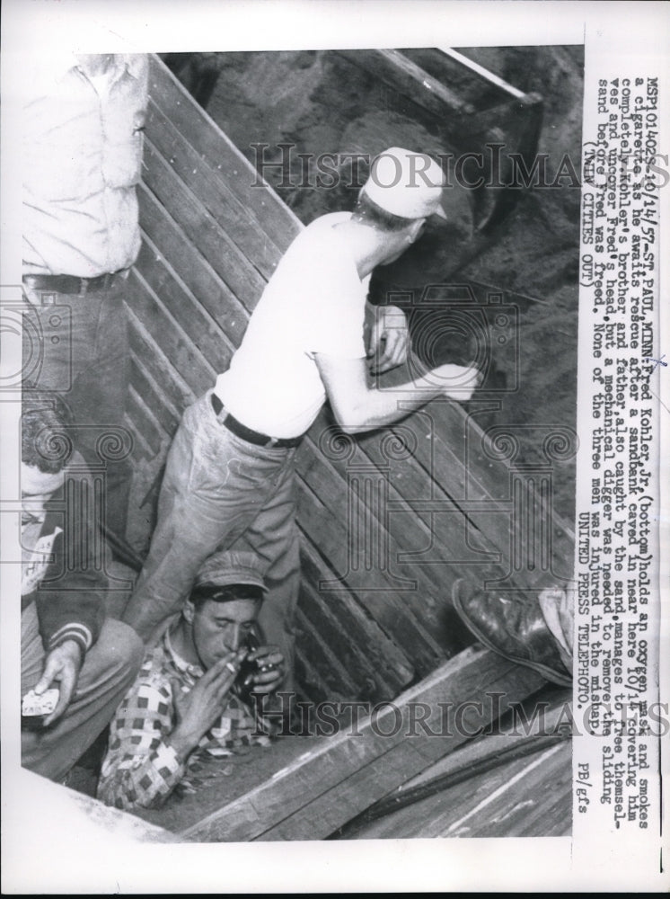 1957 Press Photo St Pail, Minn Fred Kohler Jr rescued from construction cave in