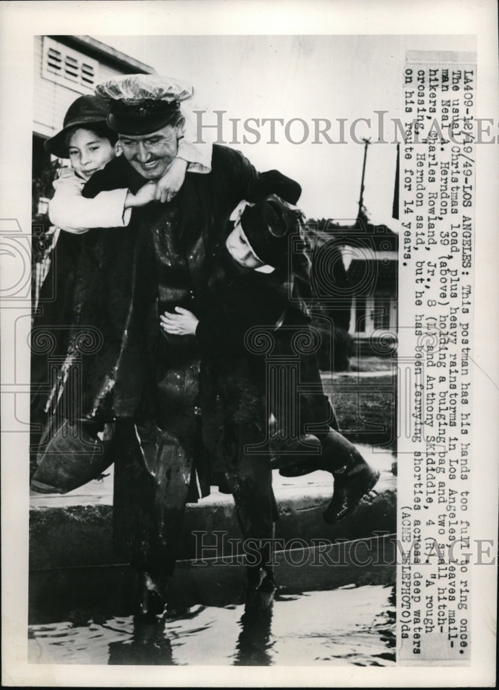 1949 Press Photo Mailman Neal A. Herndon, C Rowland Jr, A Skididdle, Los Angeles- Historic Images