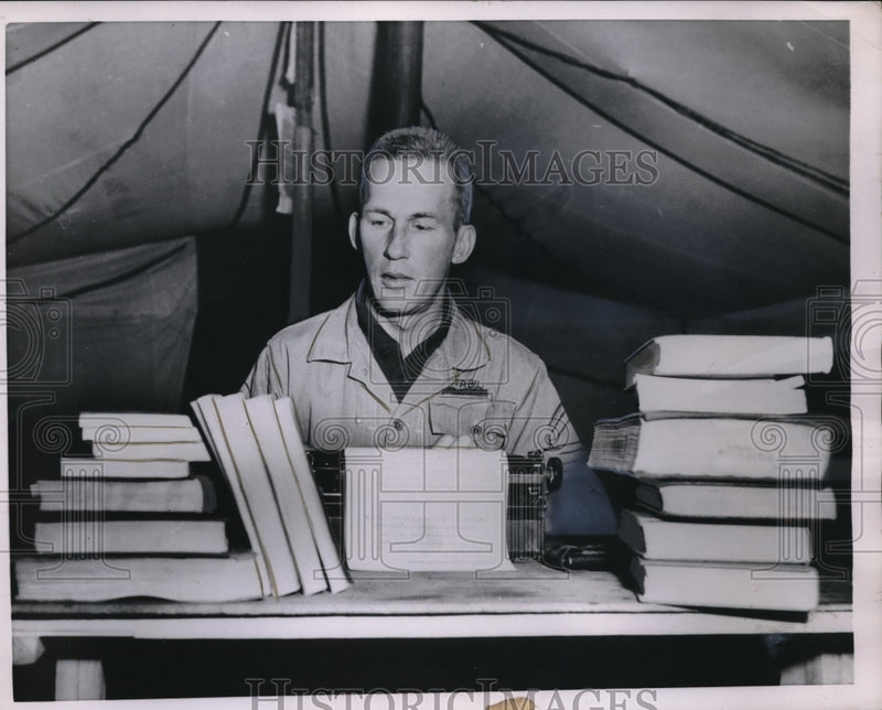 Load image into Gallery viewer, 1954 Press Photo M/Sgt. John P. Virbila in a tent in Korea
