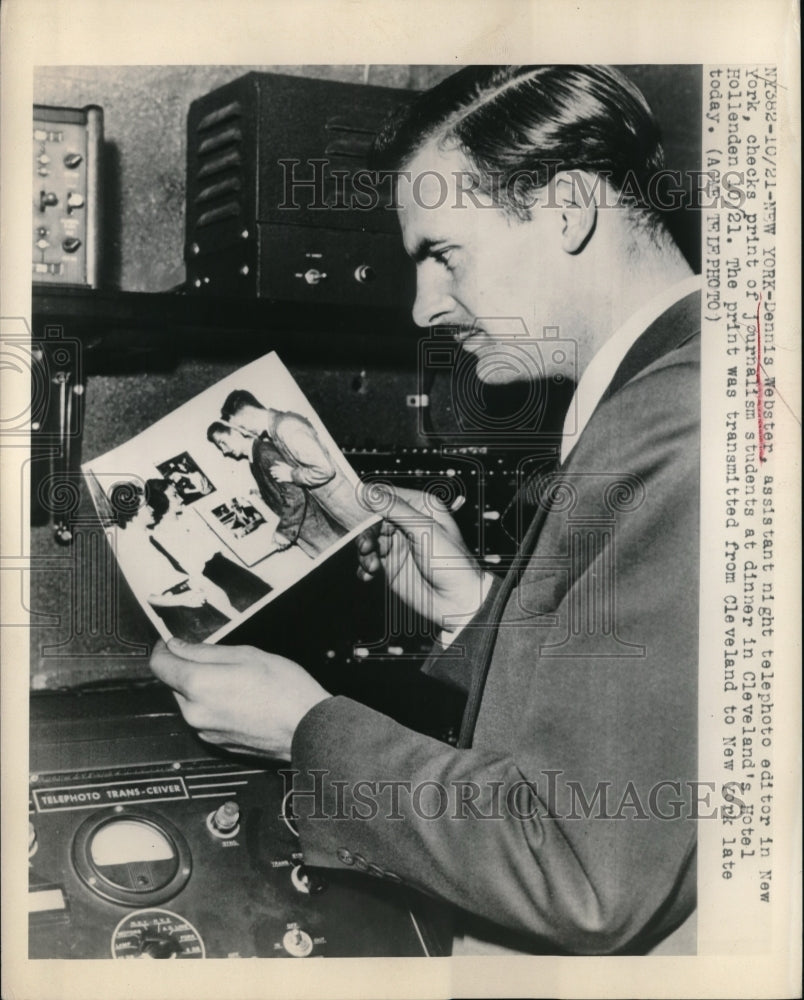 1948 Press Photo Telephoto Editor Dennis Webster Checks Print