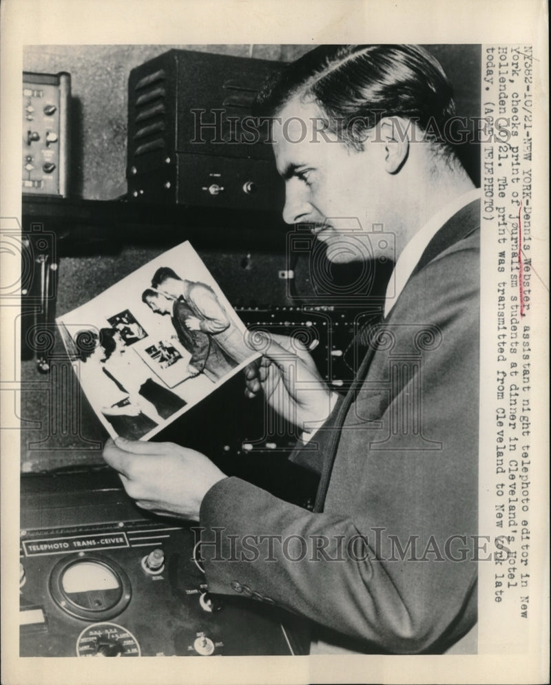 Load image into Gallery viewer, 1948 Press Photo Telephoto Editor Dennis Webster Checks Print
