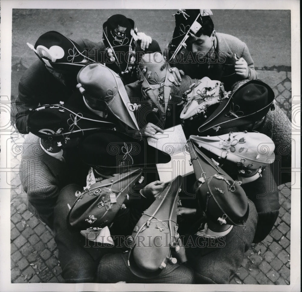 1957 Press Photo Rome University Students Showing Headgear During Festival
