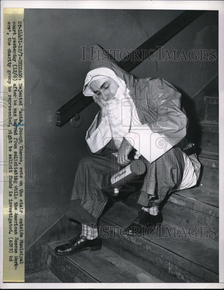 Load image into Gallery viewer, 1951 Press Photo Dejected Santa Joseph Khamoo Sits Outside Chicago Court
