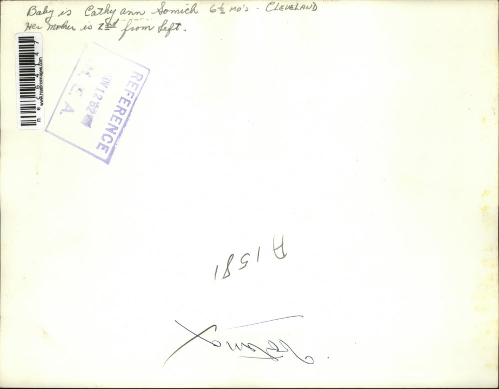 1962 Press Photo Baby Cathy Ann Somich Sleeps as Mom Votes