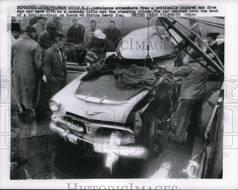 Load image into Gallery viewer, 1957 Press Photo Ambulance Attendants Free injured man from Car Troy Hills NJ
