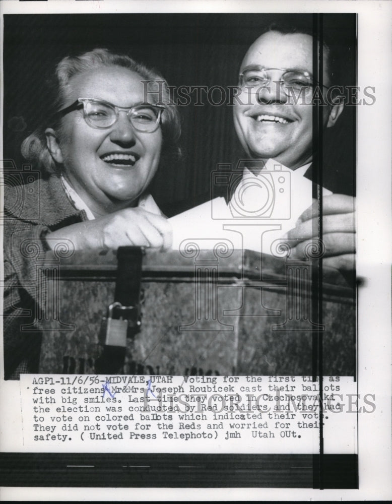 Load image into Gallery viewer, 1956 Press Photo Mr. and Mrs. Joseph Roubicek cast their ballots - nec64665
