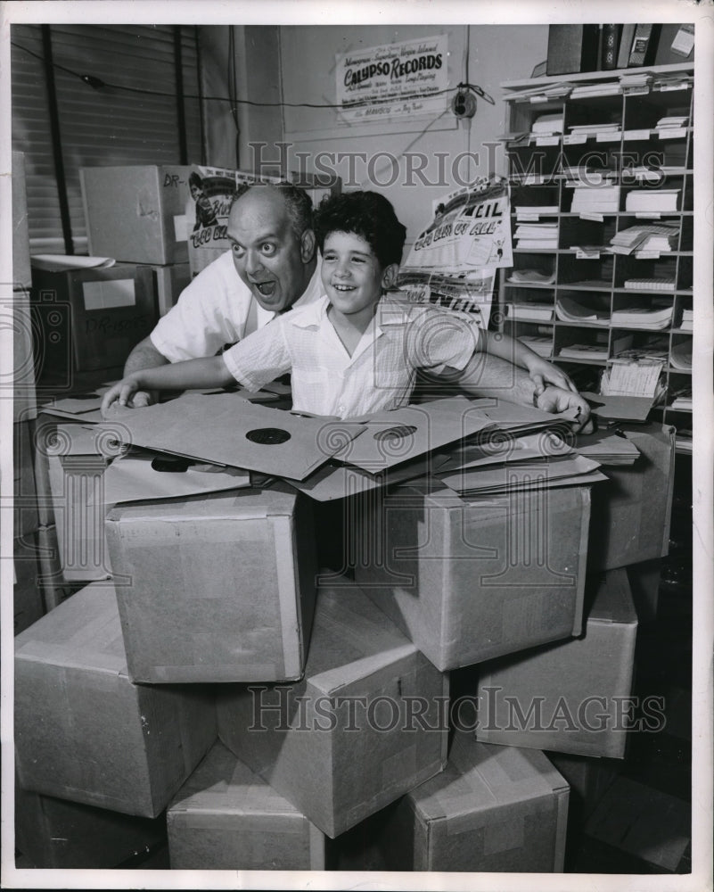 1953 Press Photo Jerry Blaine with a boy at the volume of sales