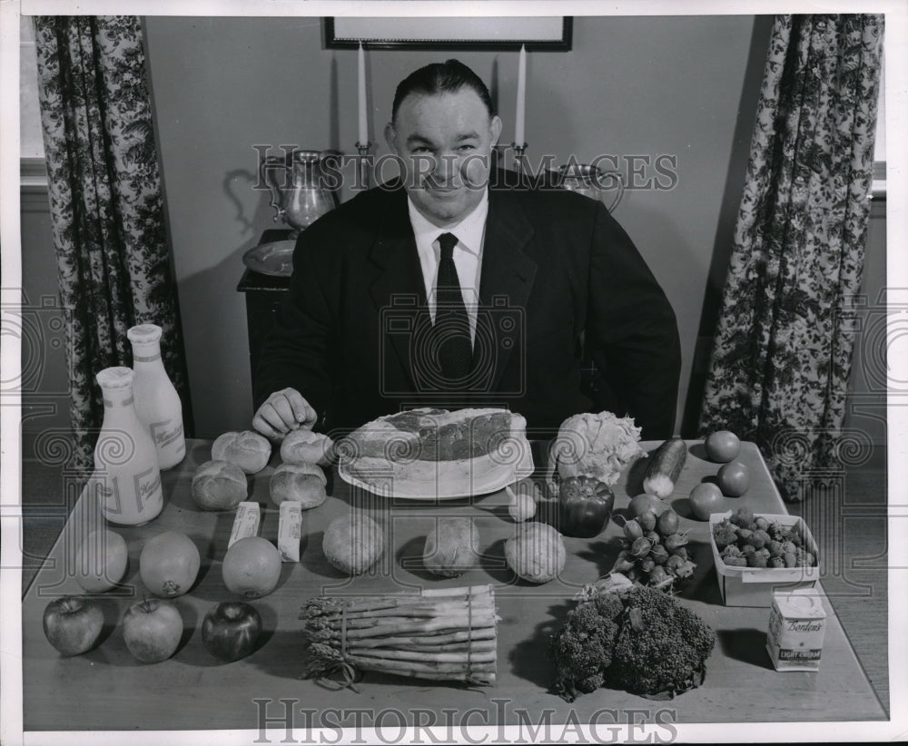 1951 Press Photo Herman Hickman with Ingredients for Dinner for two - nec65204