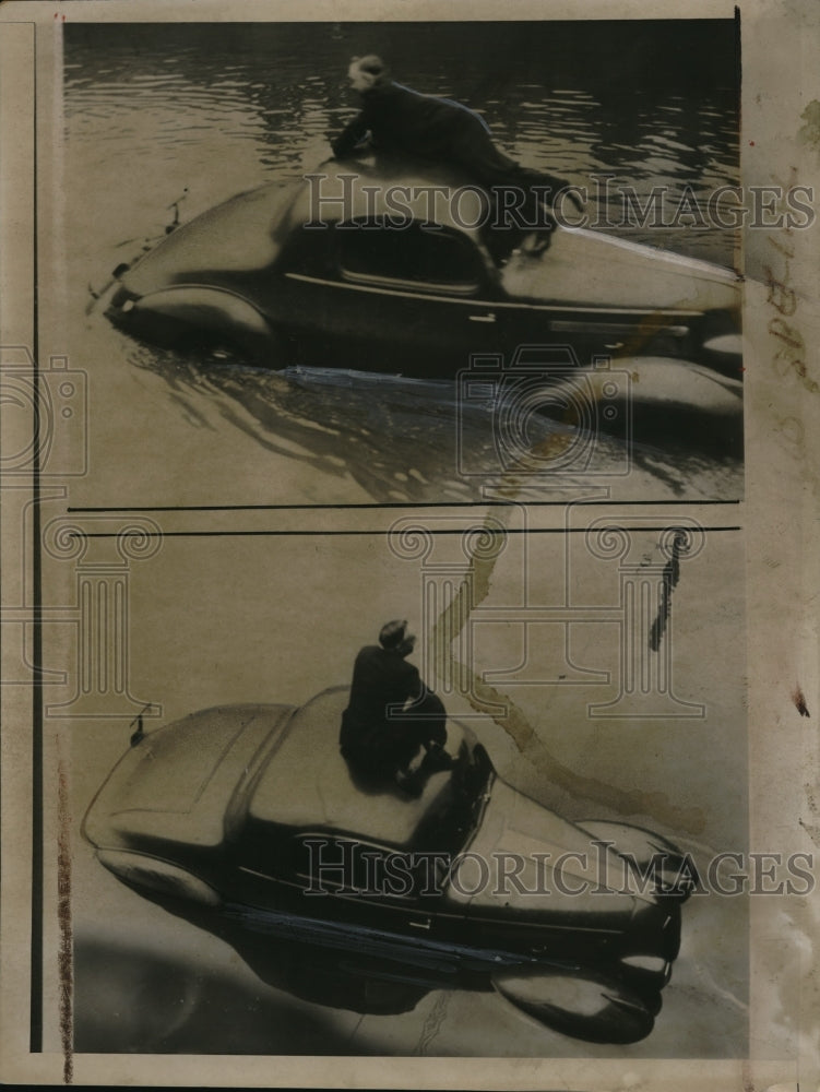 1936 Press Photo A man stuck on top of his car in floodwaters- Historic Images