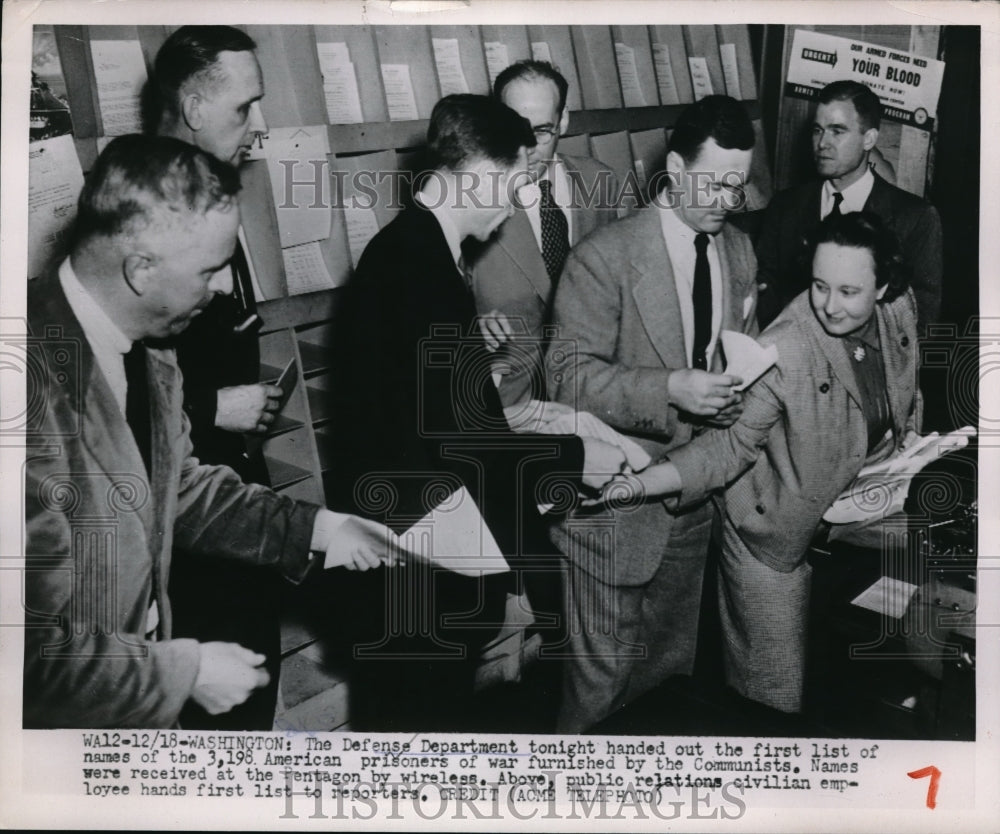 1951 Press Photo Defense Department hands out prisoner of war list - nec65485