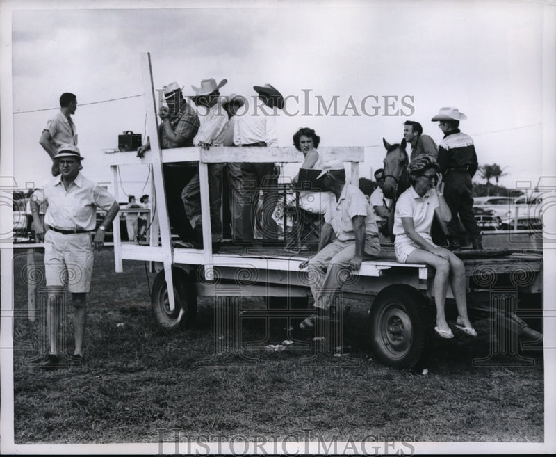 Load image into Gallery viewer, 1958 Press Photo Announcers and timers for a horse race
